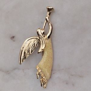 AAI angel brooch.